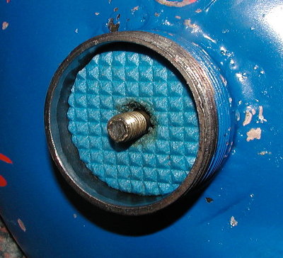 Foam bumper with moderate size pilot hole.  Acts as a &amp;quot;Dashpot&amp;quot; when the piston compresses the air in this space.