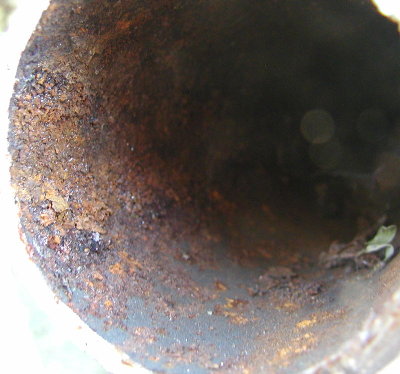 Exposure is set to show the rust inside the pipe.  Outside is overexposed as a result.
