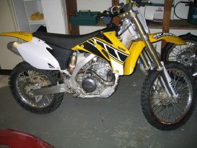 Here it is in my garage its my yz250f 50th anniversery edition