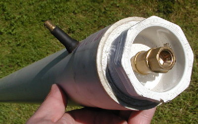 A ball valve concealed in the breech hides the true nature of the launcher as a coaxial piston launcher.