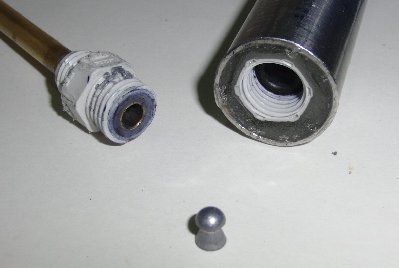 detail of the breech and ammunition.  The threaded portion is taken from an electrical connector set in epoxy, note the chamber wall thickness.