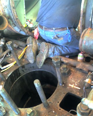 looking at the cylinder with the liner and piston removed.  and theres big john.  ever heard the song?