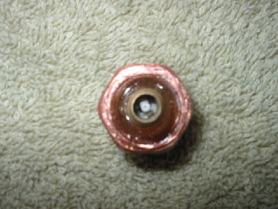fill side of shrader on hex side of threaded adapter. The socket where you would normally insert the copper pipe I cut off to make the gun shorter.