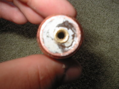 Shrader on threaded side of screw adapter.
