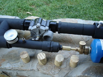 view of the breach propane valve, gauge, and schrader valve