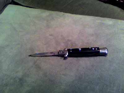 This is my switch blade or maybe its a stiletto I don't know which one is which, it probably my favorite knife, its really sharp.