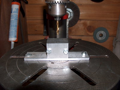 Replace the drill bit with a &amp;quot;starter bit&amp;quot; or short, stiff drill bit. Place the mold blocks &amp;quot;bottom&amp;quot; down on the alignment pin.  Drill a shallow hole.