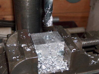 Drill to final size with a SHARP bit. Feed to depth very slow, use a LOT of WD-40.