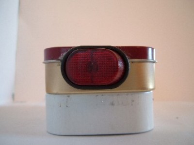 Switch mounted with the lid closed on Altiods Tin.
