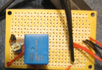the circuit, the 3red, and 3 black wires are to the 3 batteries, all the -'s are on a common grounding lead, the thick black wires are to the solenoid, and there is a resistor on the bottom