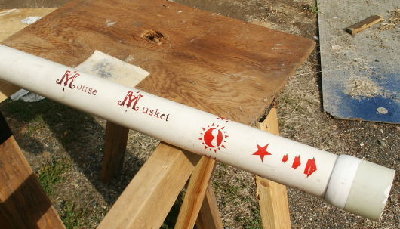The mouse musket. 1 inch barrel coaxial in a 2 inch chamber.  The hole in the plywood was made by a gumball fired from this cannon.