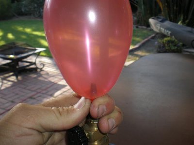 Just fill up a water balloon or any balloon then tie the bottom.