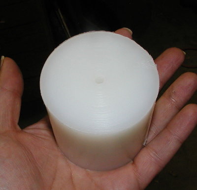2-1/2 UHMWHDPE round stock.  I was given a piece.