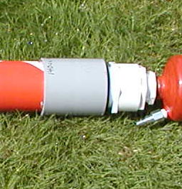 Close up picture of the coupler.  The reducer from 2.5 to 2 inch is cut short and inside, then a ABS female adapter is inside that for a small dead space when used on the big 2 inch valve.  The white PVC is only threaded adapters so it will fit on the small tank.  They are removable.<br /><br />The barrel volume is written on the coupler to make barrel selection and GGDT modeling easy for any barrel tank combination.
