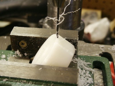 EQ port is drilled from the chamber area to the pilot area