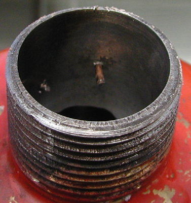The piston normally stops just short of the pin, but if someone slams the valve closed it hits the pin, still too far back to unseat any o ring.