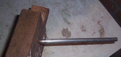 OUCH!! silent but...<br /><br />No way of getting it out without destroying the arrow.<br />With a longer spike I believe it would have gone through.<br /><br />My brothers combound bow could not do this.I did it with a 29 cm total length sawed-off pneumatic.
