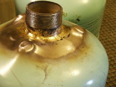 Disposable Freon tank with 2 inch valve brazed into place.