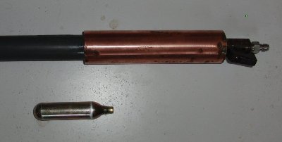 chamber closeup with a 12 gram capsule for size comparison
