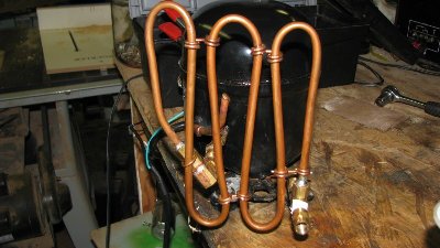 My simple copper radiator.<br />I hoped it would also help contain the oil to reduce the amount that comes out.