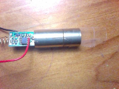 This is the module which is the laser pretty much without case and battery, you put positive to positive and negative to negative, fairly complex stuff but some people are able to pull it off