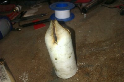 Bent after heating with propane torch.
