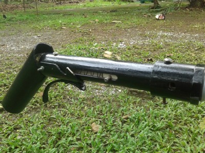 poorly painted and attached to the gun