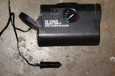 Compressor with plug