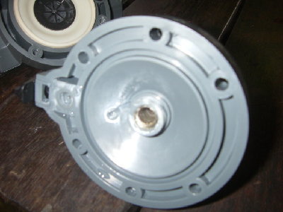 Where the guide rod would have been. Now it is where the blowgun is connected.