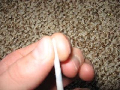 Wet the end and then roll it between your fingertips