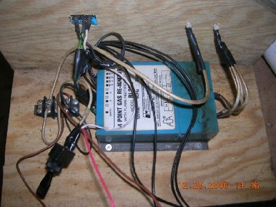 igniter being mounted in the control panel. fan switch and electric propane solenoid are also being installed along with some arming lights and a keyed ignition switch.
