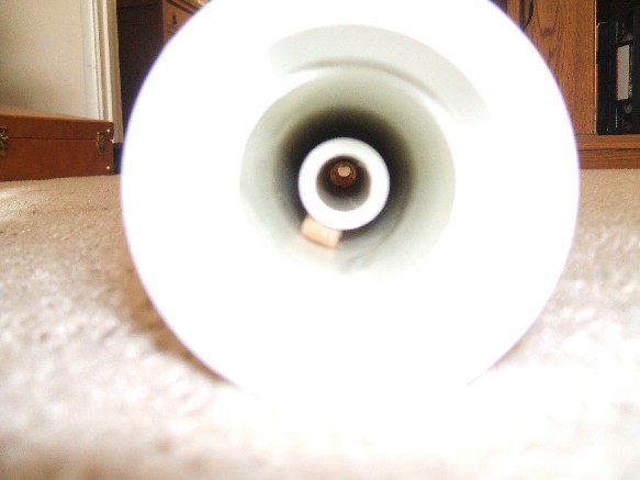 Looking down the barrel through the chamber. The little barrel support is half of a clothespin.