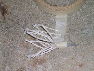 Roll it slowly, keeping the tape flush with the nail's head