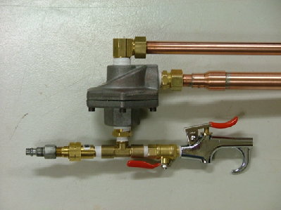 close up of the trigger and the QEV
