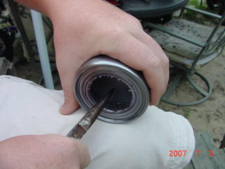 To smooth the inner edge out use the needle nose pliers round edge.St the can on your leg like in the picture and press down on the edge with pliers.At the same time roll the can.You will soon begin to see the edge folding down and smoothing out.Continue this process until you get close to the black line.