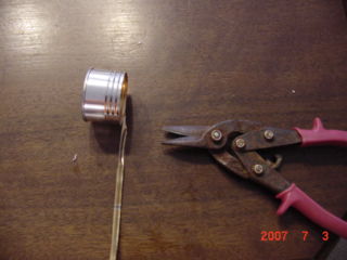 If need be trim the inner can down so that the top rim is sitting flush on the tuna can top and the bottom of the inner can is also flush on the bottom.