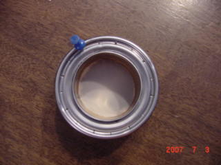 Finally punch the jet holes with the thumbtack(use the pliers to hammer if it to hard to press down) and you are finished<br />In the case that your stove does not seal around the inner wall(the tomato can).this will be noticed by a lack of pressurization on the side of the leak side and flames coming out of the leak instead of the jets.To fix this seal the leak off with JB weld or a similar high heat epoxy.