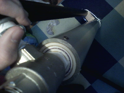 0315081515.jpg (165.96 KiB) Viewed 1367 times The home made bushing (yes, there is a dirty sock in the picture)