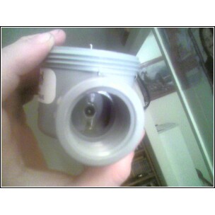 Looking into the barrel side of the valve, you can see the hole and the epoxy